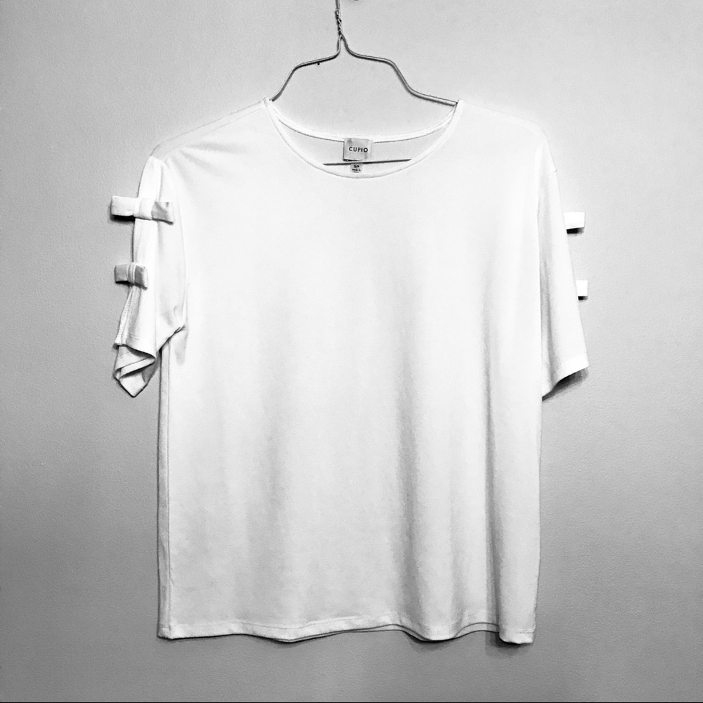 White blouse with bow tie sleeves